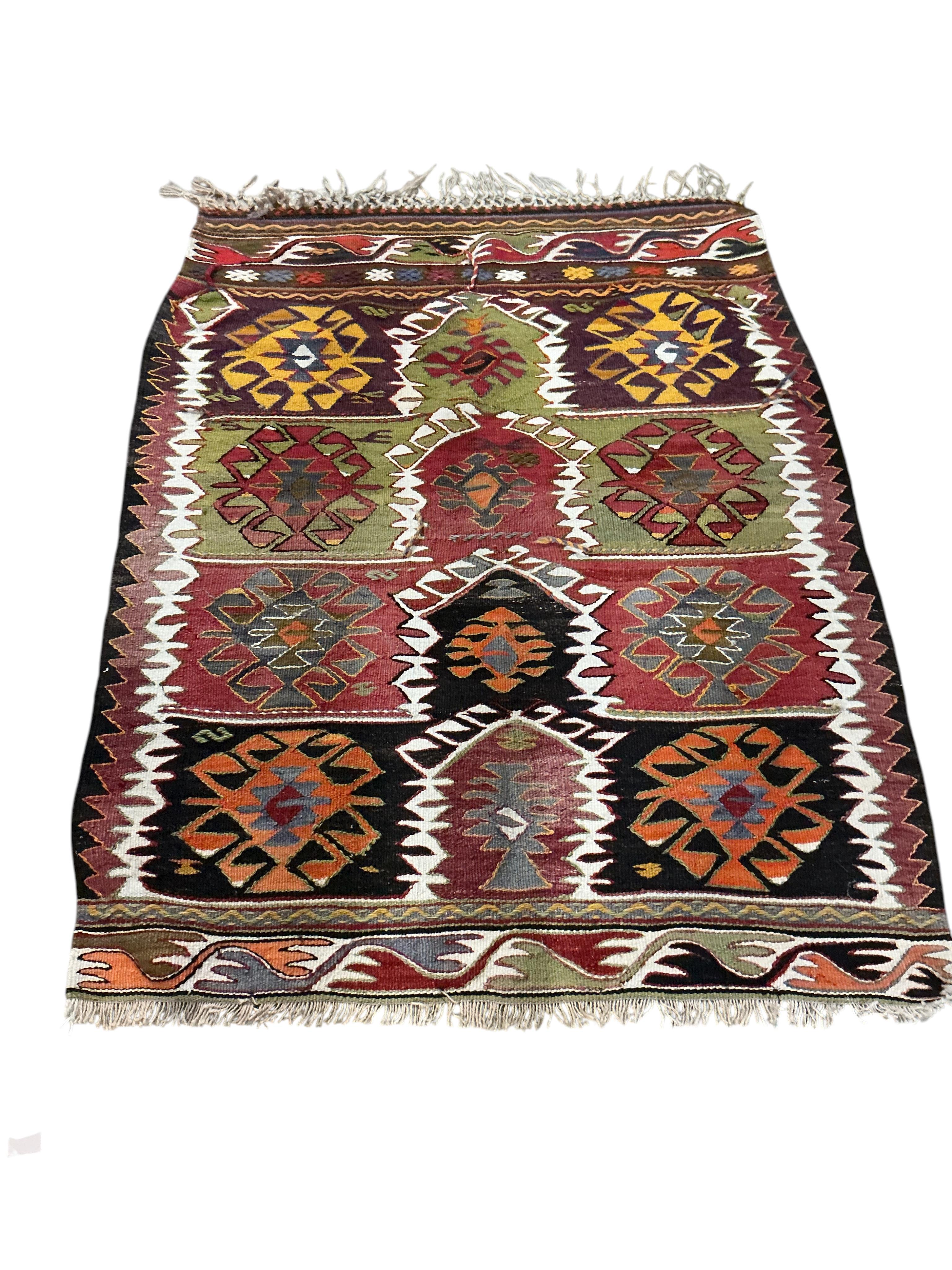 A Kilim polychrome flatweave rug, 140 x 105cm